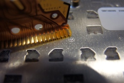 If you look more in detail you see pins isolated with the capton tape